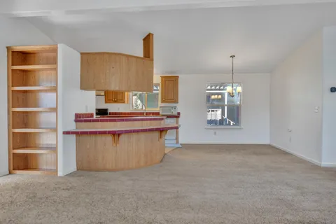 a view of a kitchen with a sink