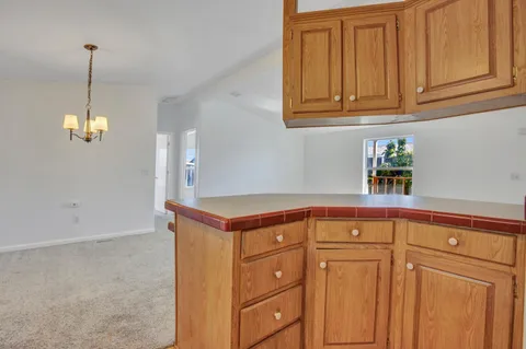 a utility room with cabinets