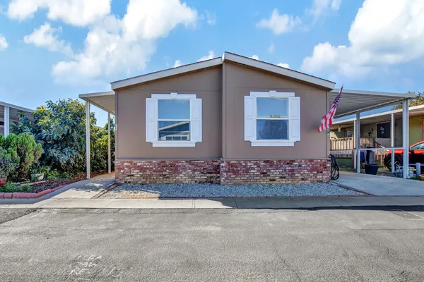 a front view of house with yard