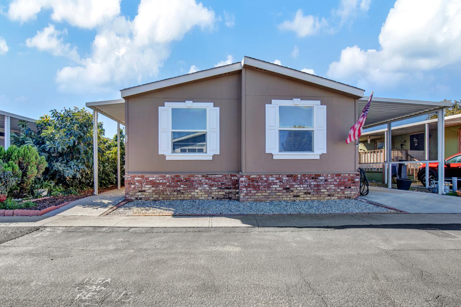 5130 County Road 99W, Unit 82 Dunnigan, CA 95937 - Photo 2 of 39 a front view of house with yard