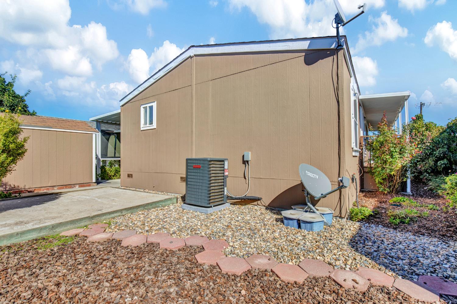 5130 County Road 99W, Unit 82 Dunnigan, CA 95937 - Photo 32 of 39 a view of a backyard with plants