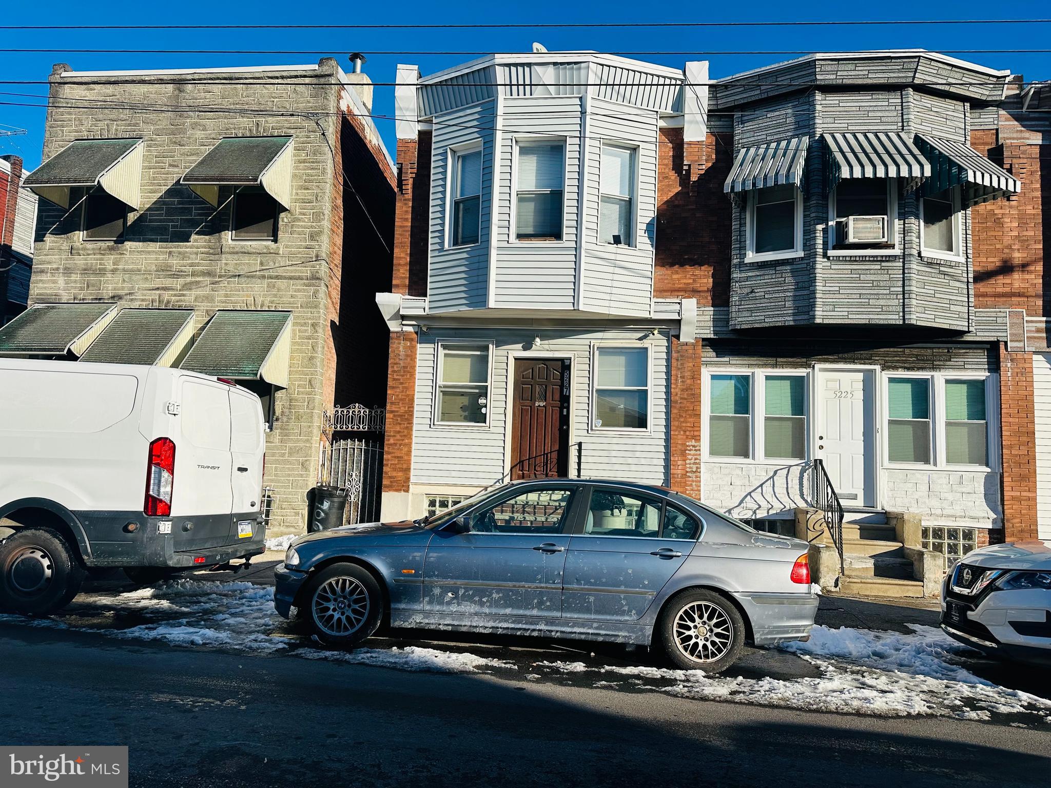 5227 North 3rd Street Philadelphia, PA 19120 - Photo 2 of 22 a front view of a house with parking