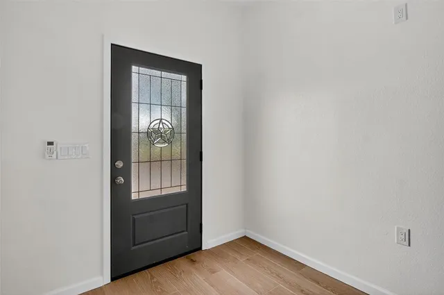 a kitchen with stainless steel appliances granite countertop a refrigerator stove and microwave