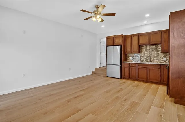 a house with trees in the background