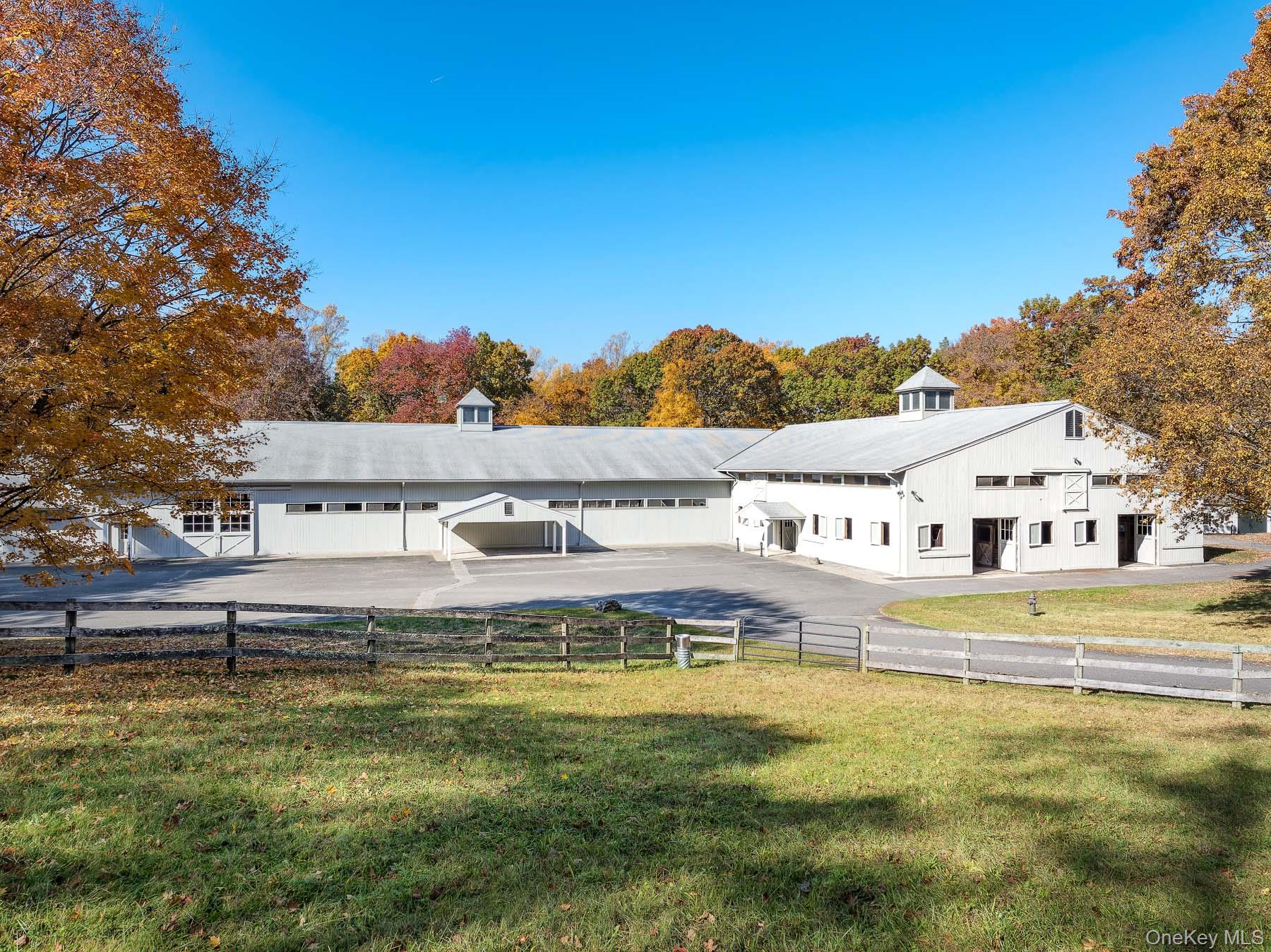 48 Raafenberg Road Sleepy Hollow, NY 10591 - Photo 20 of 37 a view of an ocean with a house in the background