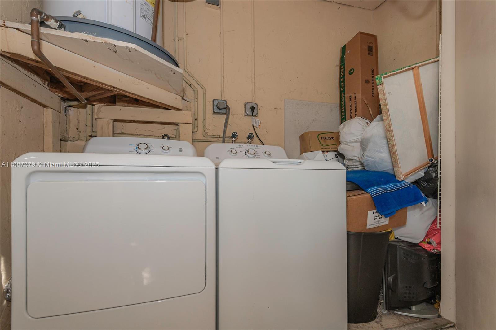 20015 Northeast 3rd Court, Unit 6 Miami, FL 33179 - Photo 24 of 31 a utility room with dryer and washer