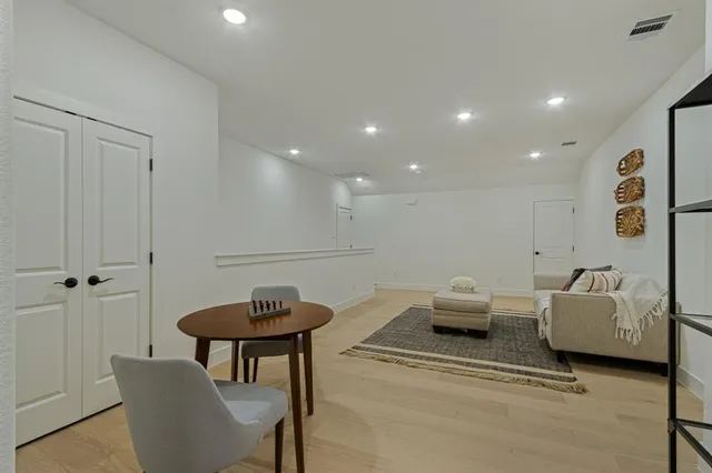 a living room with furniture and a table