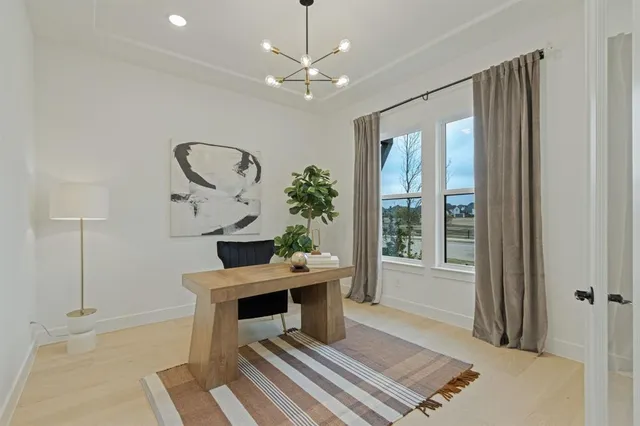 a room with furniture and a window