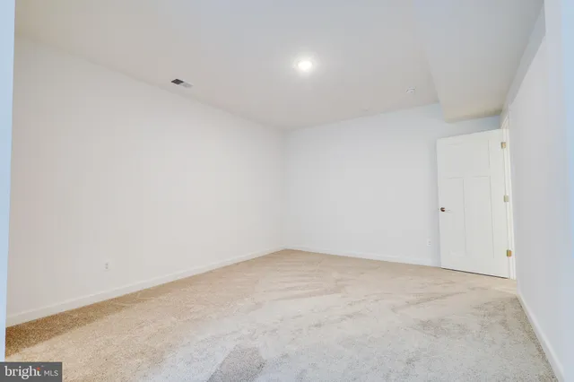 an empty room with an entryway