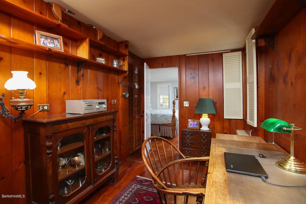 82 Chestnut Hill Loop Montague, MA 01351 - Photo 13 of 36 a living room with furniture a dining table and chairs
