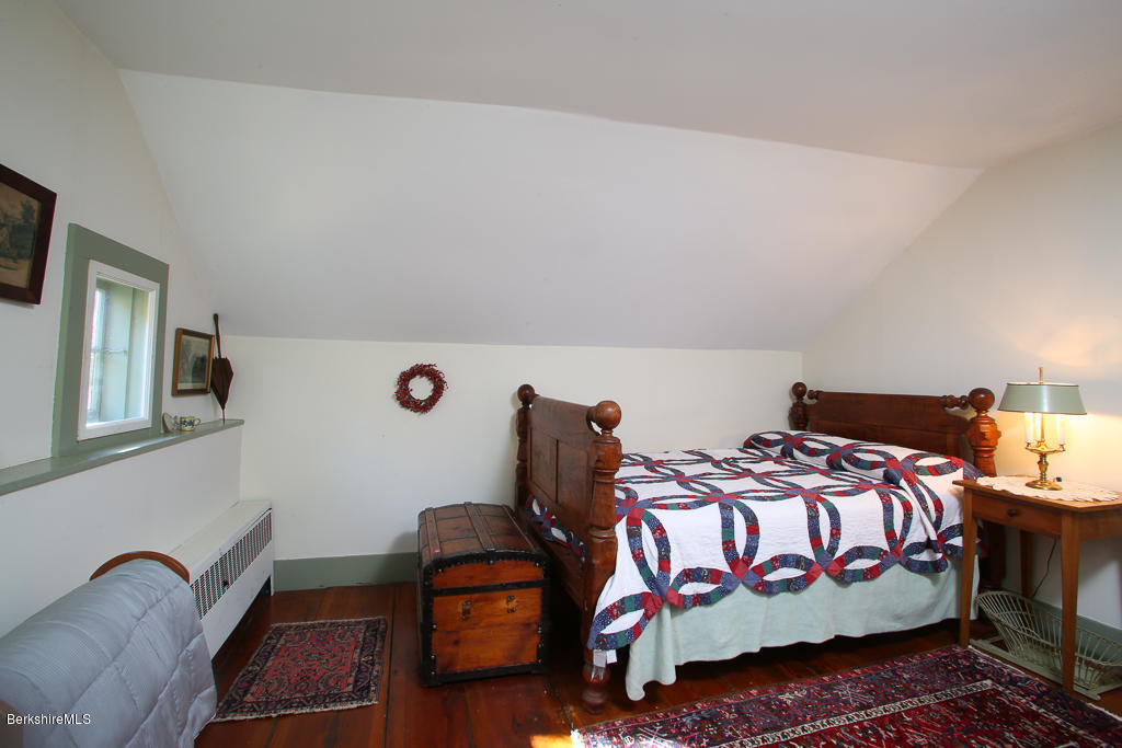 82 Chestnut Hill Loop Montague, MA 01351 - Photo 16 of 36 a bedroom with bed and a window