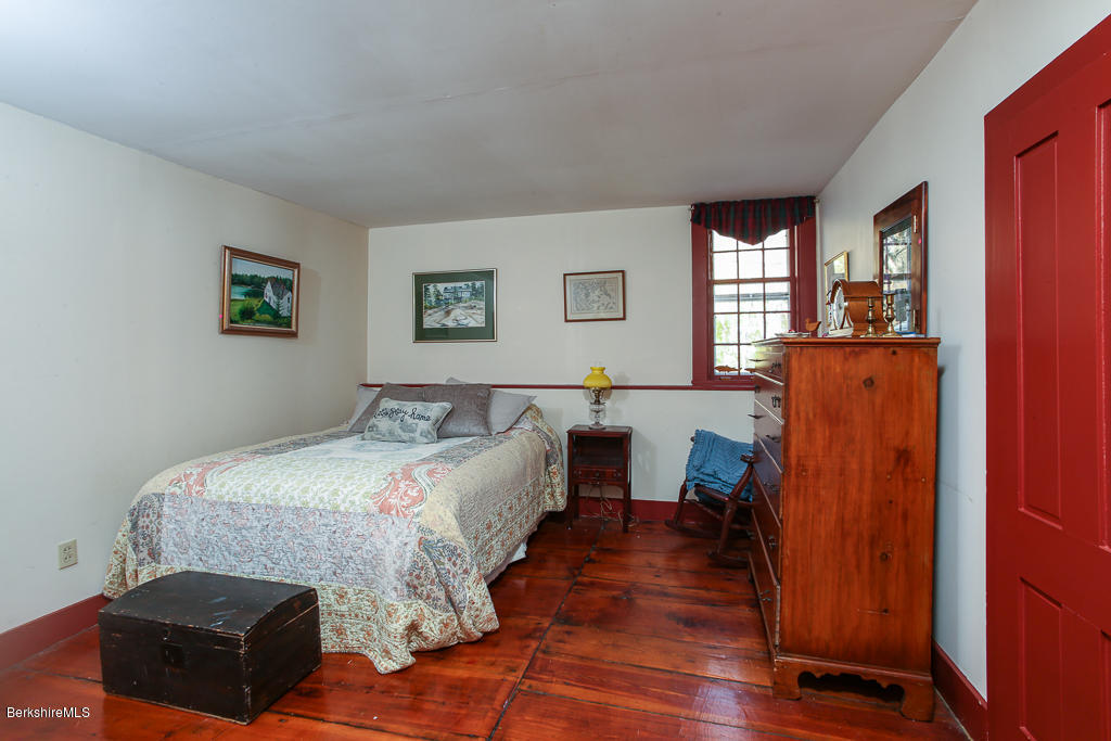 82 Chestnut Hill Loop Montague, MA 01351 - Photo 18 of 36 a bed room with bed and window