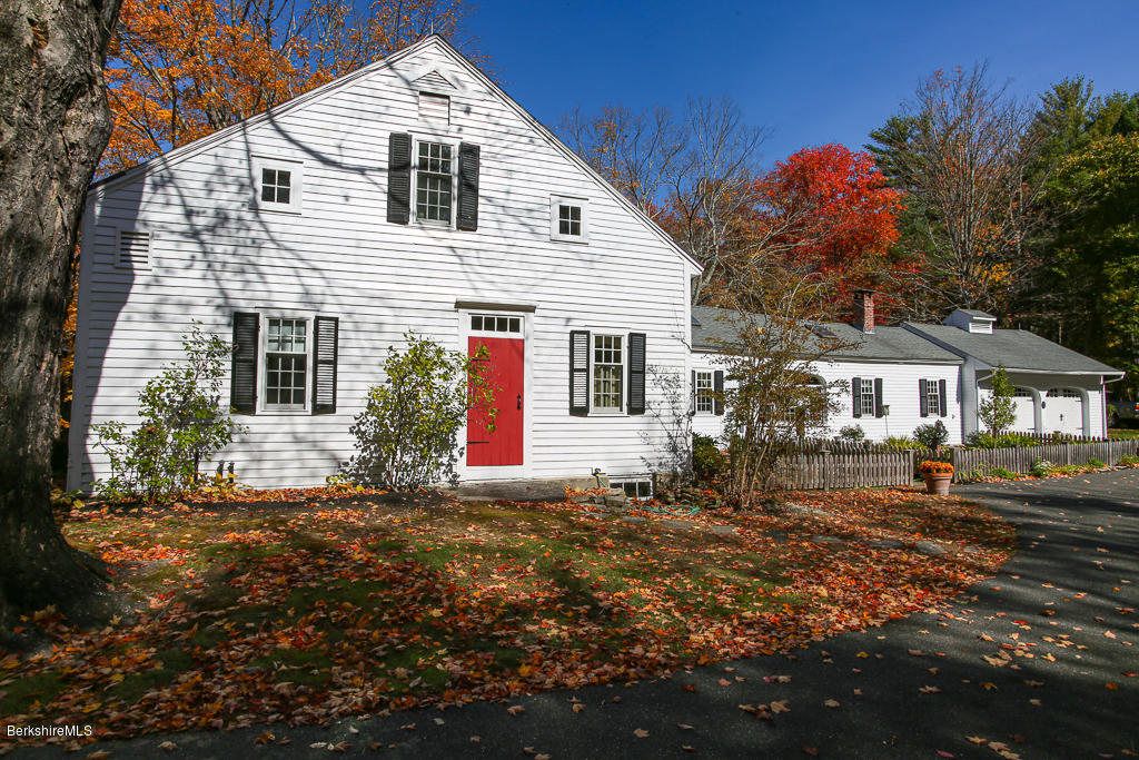 82 Chestnut Hill Loop Montague, MA 01351 - Photo 3 of 36 a front view of a house with a yard