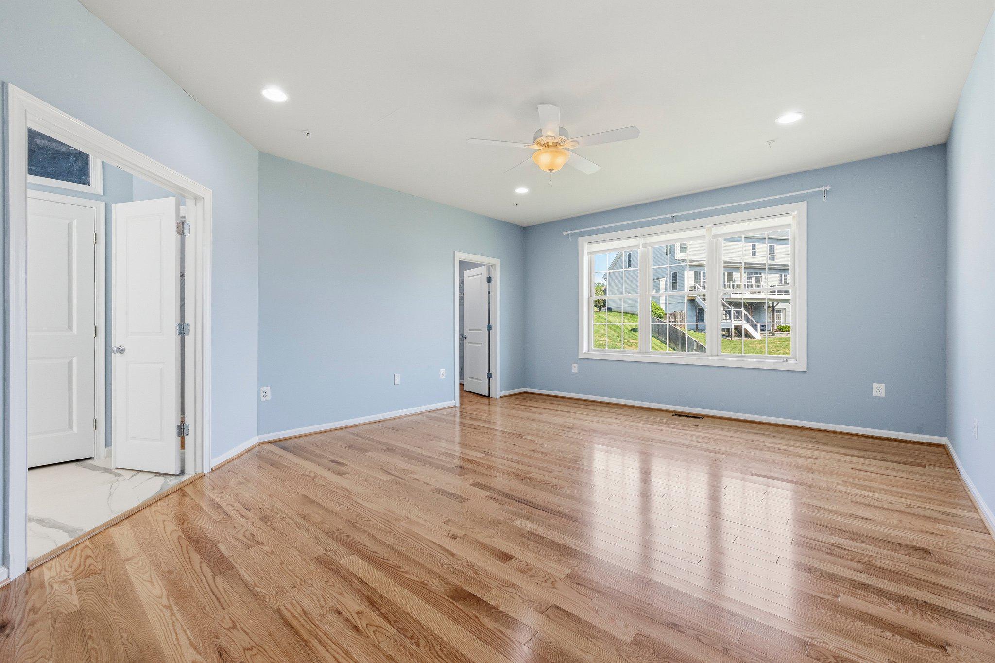 1105 Verbena Court Silver Spring, MD 20906 - Photo 21 of 78 Primary Bedroom with doors to bathroom and closet.