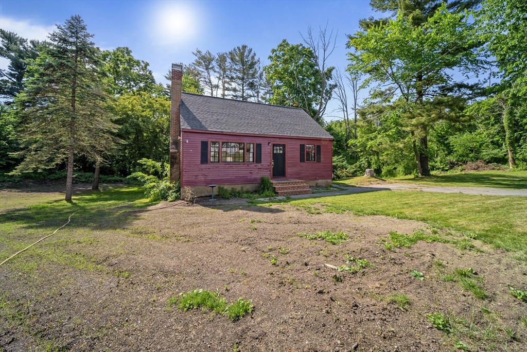 13 Rattlesnake Hill Road Andover, MA 01810 - Photo 1 of 25 a view of a house with a yard