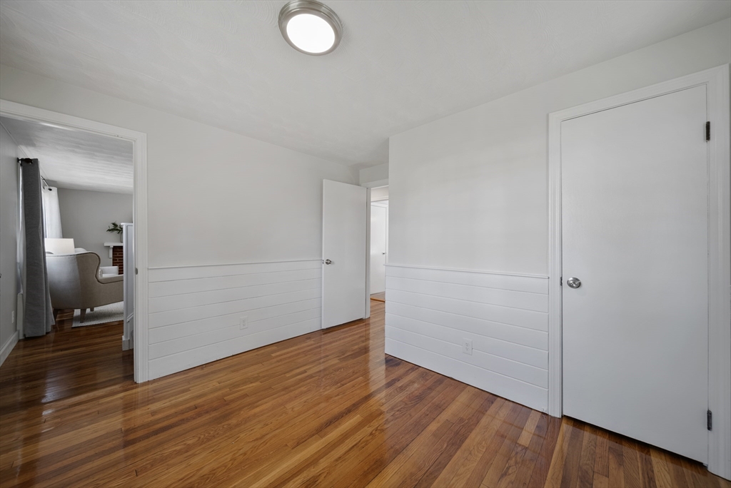 13 Rattlesnake Hill Road Andover, MA 01810 - Photo 14 of 25 a view of a livingroom with wooden floor