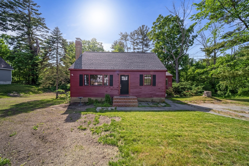 13 Rattlesnake Hill Road Andover, MA 01810 - Photo 2 of 25 a view of a house with a yard