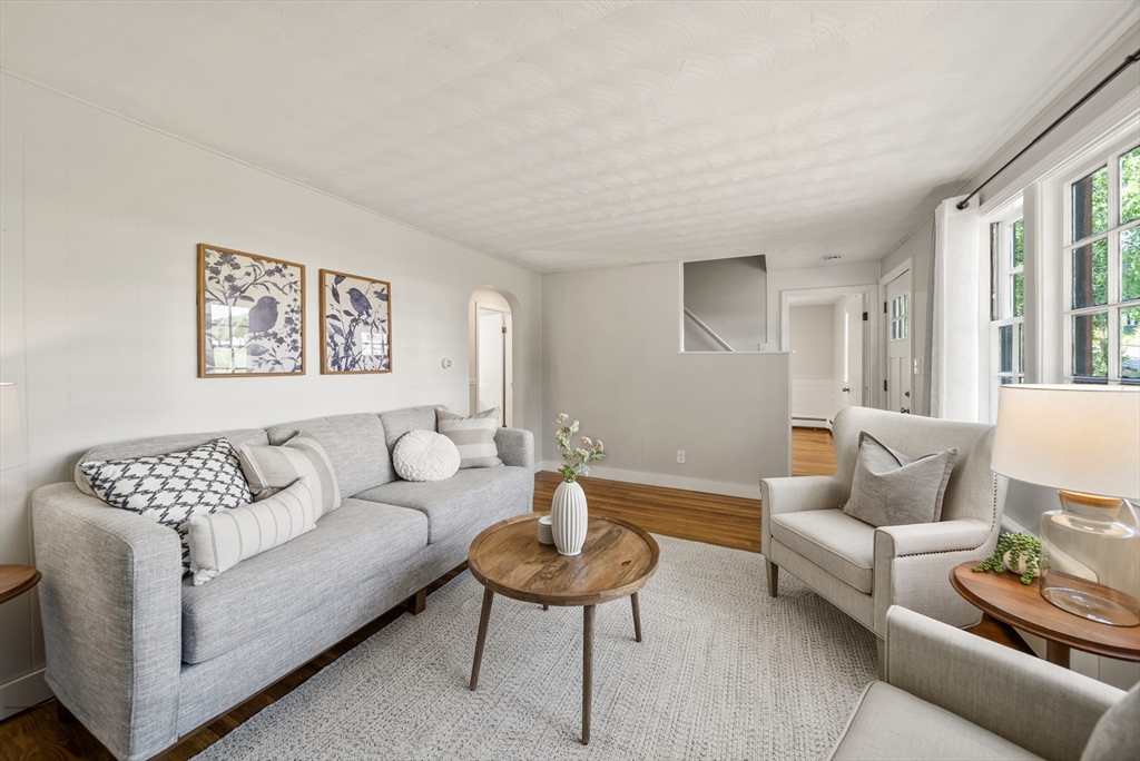 13 Rattlesnake Hill Road Andover, MA 01810 - Photo 7 of 25 a living room with furniture and a large window