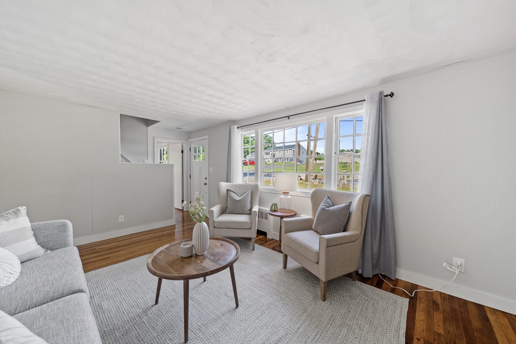 13 Rattlesnake Hill Road Andover, MA 01810 - Photo 8 of 25 a living room with furniture and a window