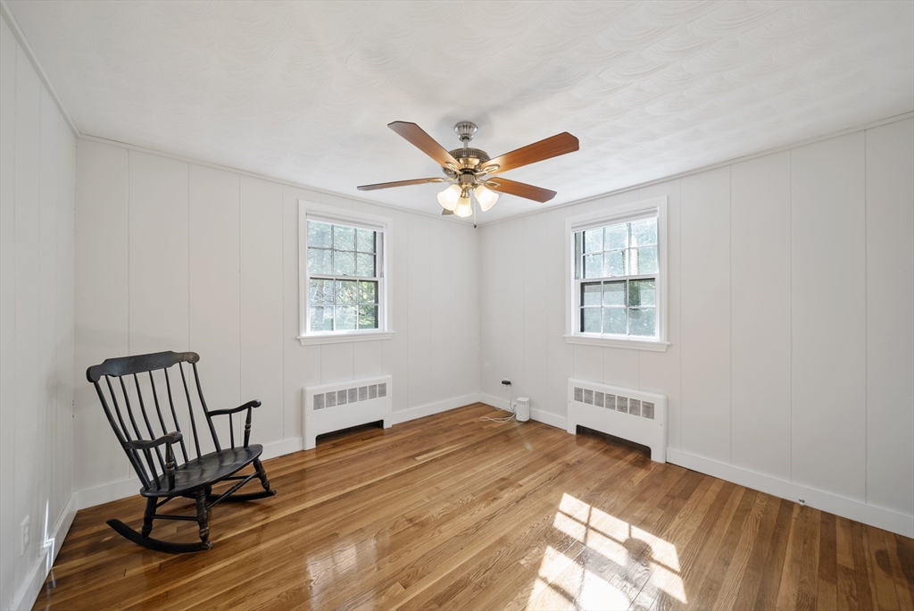 13 Rattlesnake Hill Road Andover, MA 01810 - Photo 9 of 25 a workspace with wooden floor and a window