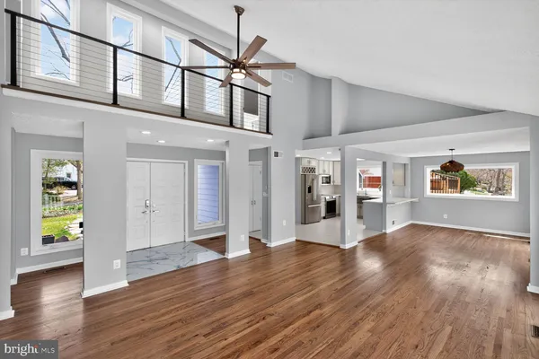 a kitchen with cabinets and window
