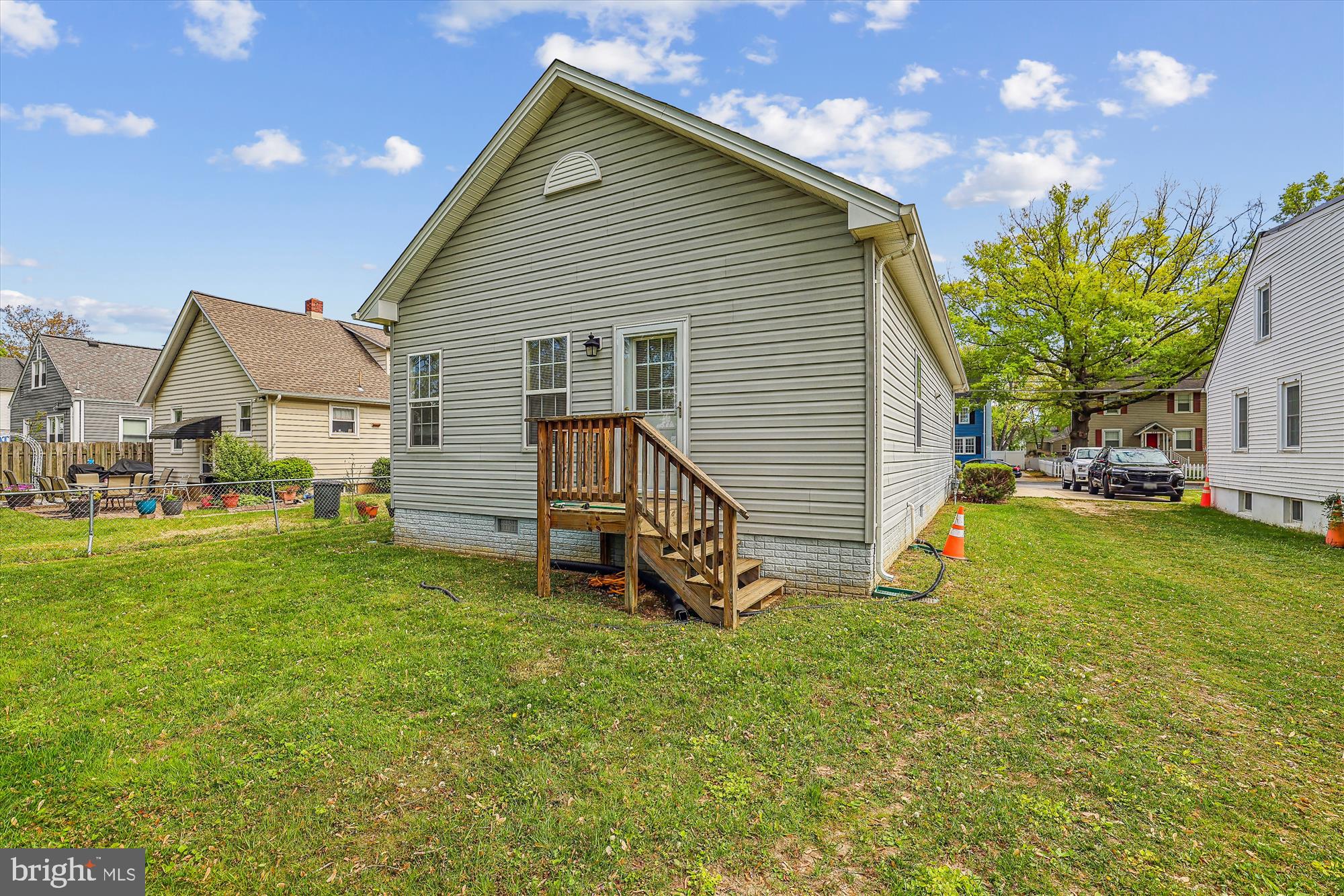 404 Talbott Avenue Laurel, MD 20707 - Photo 14 of 24 a view of a house with a backyard