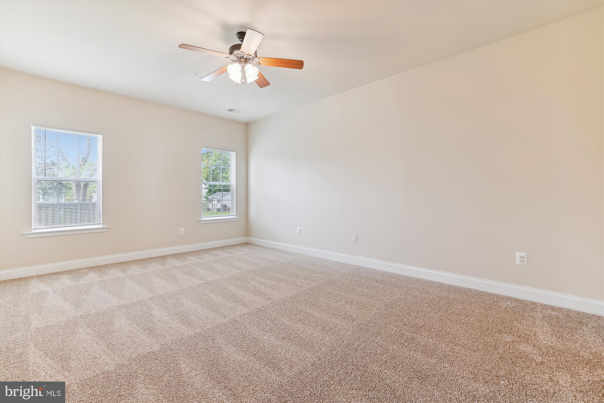 404 Talbott Avenue Laurel, MD 20707 - Photo 19 of 24 a view of an empty room with a window