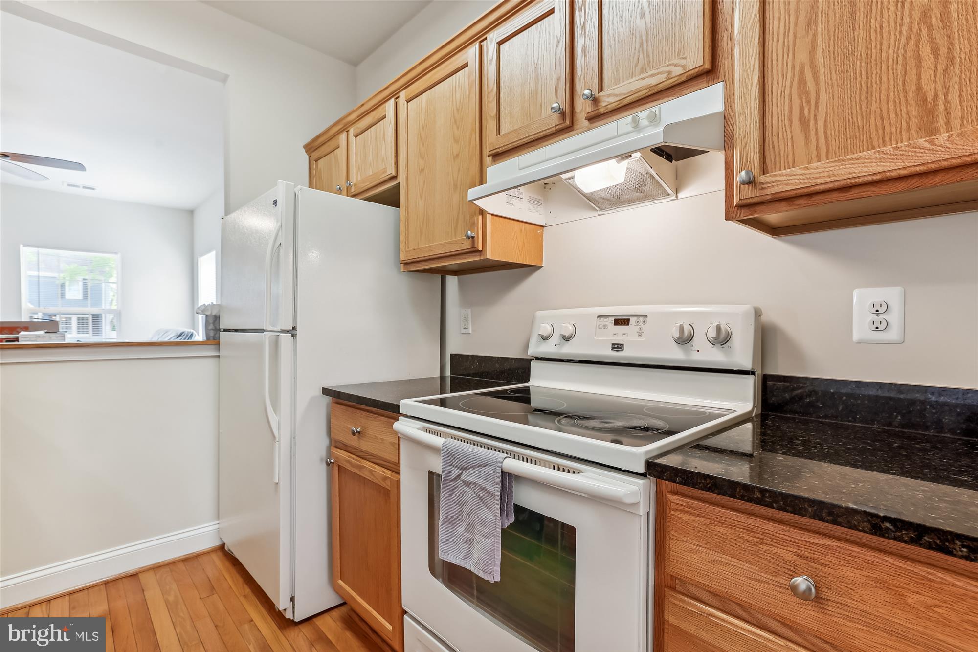 404 Talbott Avenue Laurel, MD 20707 - Photo 6 of 24 a kitchen with stainless steel appliances granite countertop a refrigerator and a stove