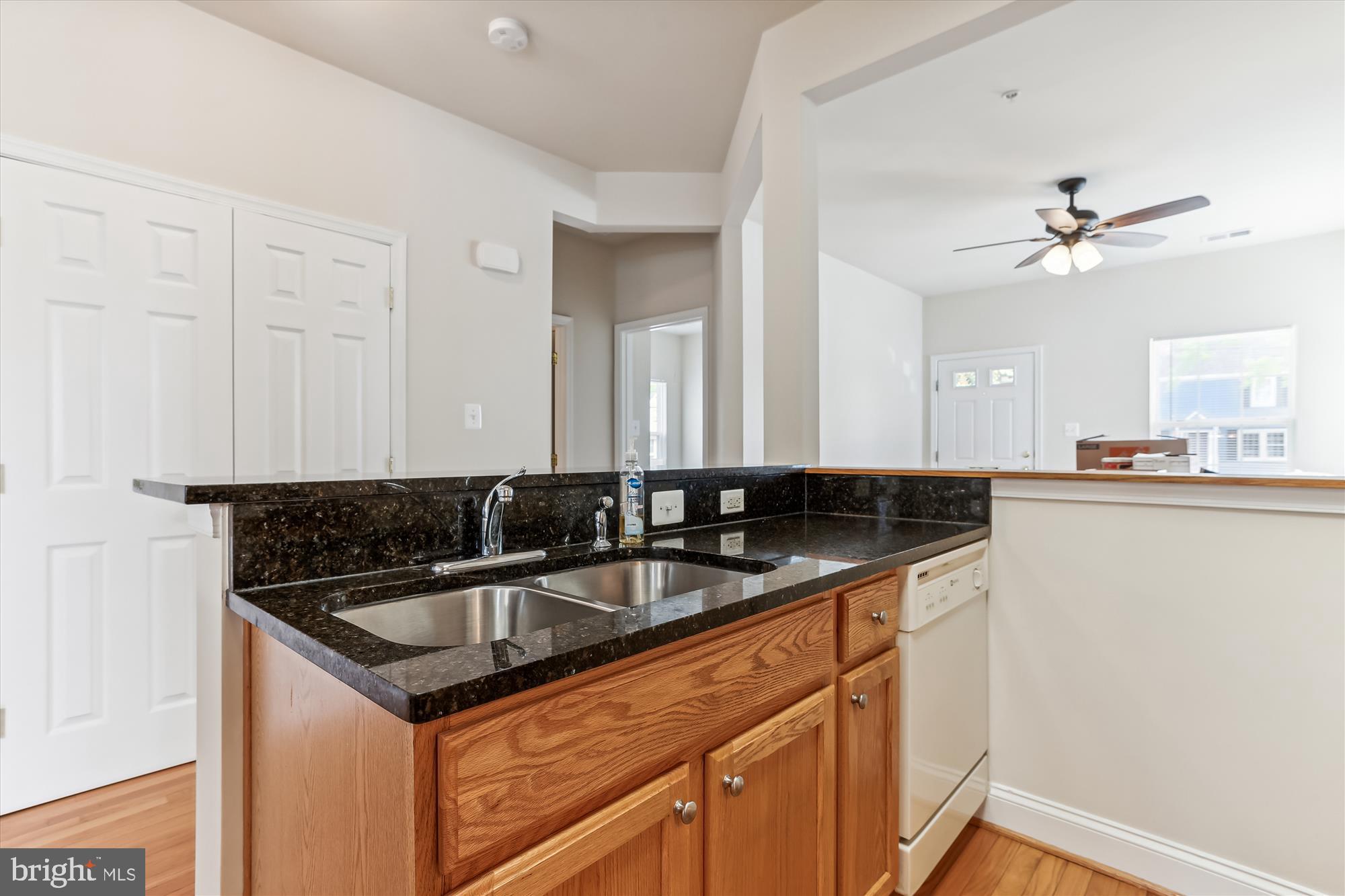 404 Talbott Avenue Laurel, MD 20707 - Photo 7 of 24 a kitchen that has a sink and cabinets