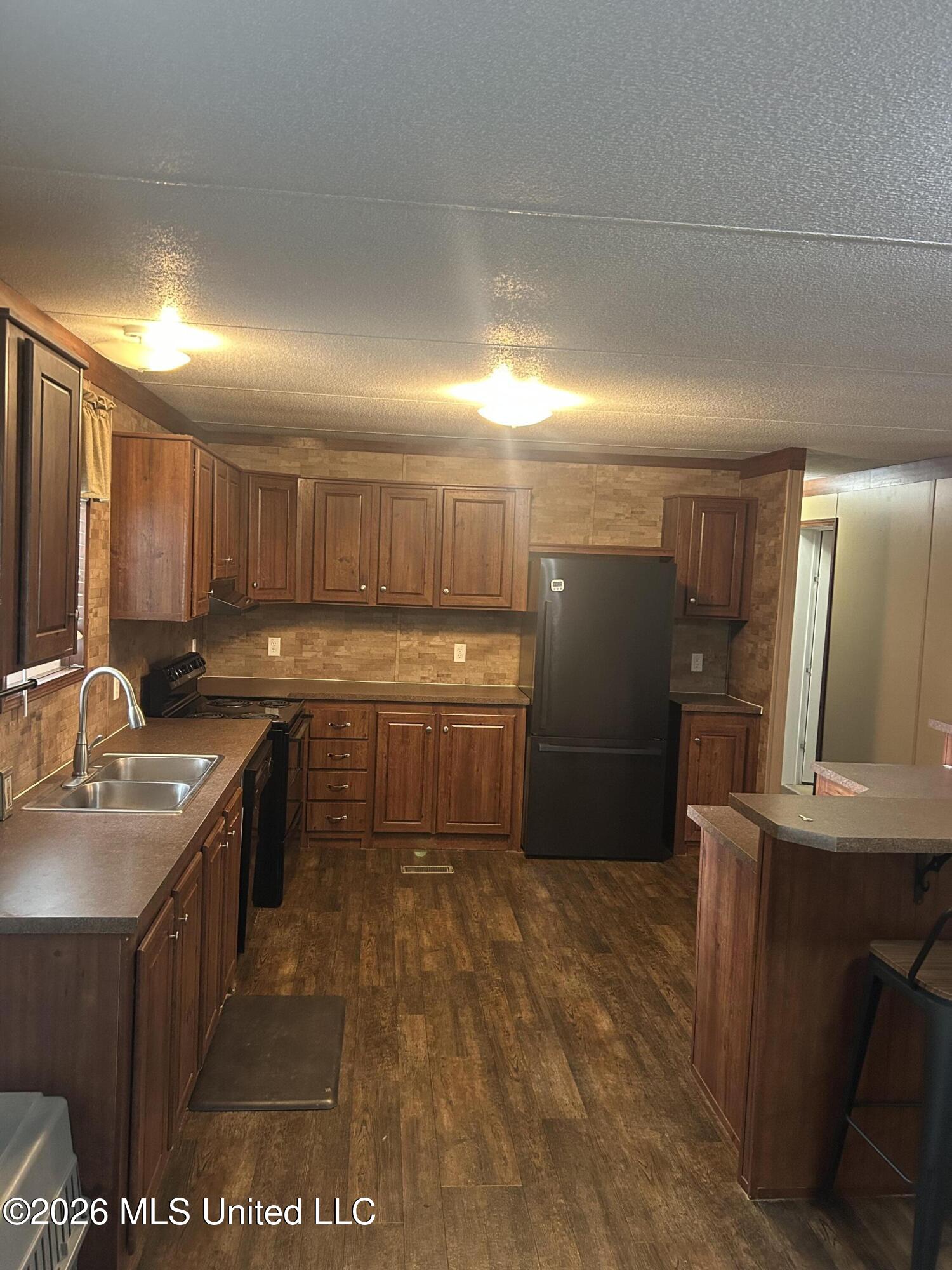 7177 Thompson Road, Unit A Smithdale, MS 39664 - Photo 3 of 12 IMG_7207