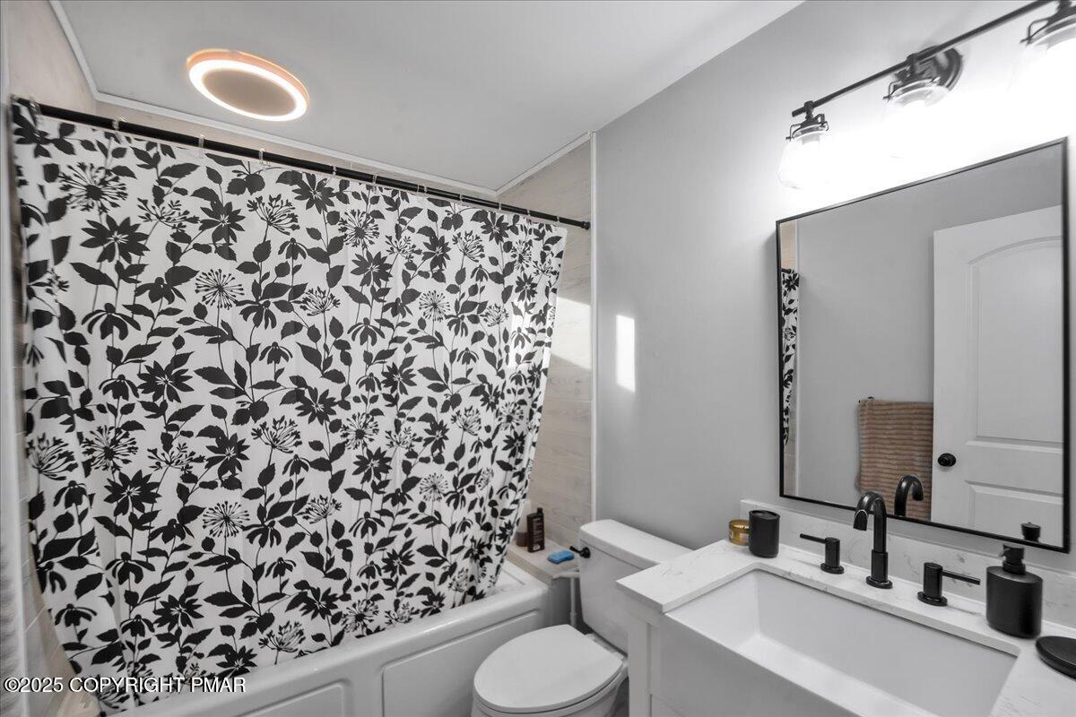 306 Timber Hill Road Henryville, PA 18332 - Photo 11 of 23 a bathroom with a sink toilet and shower