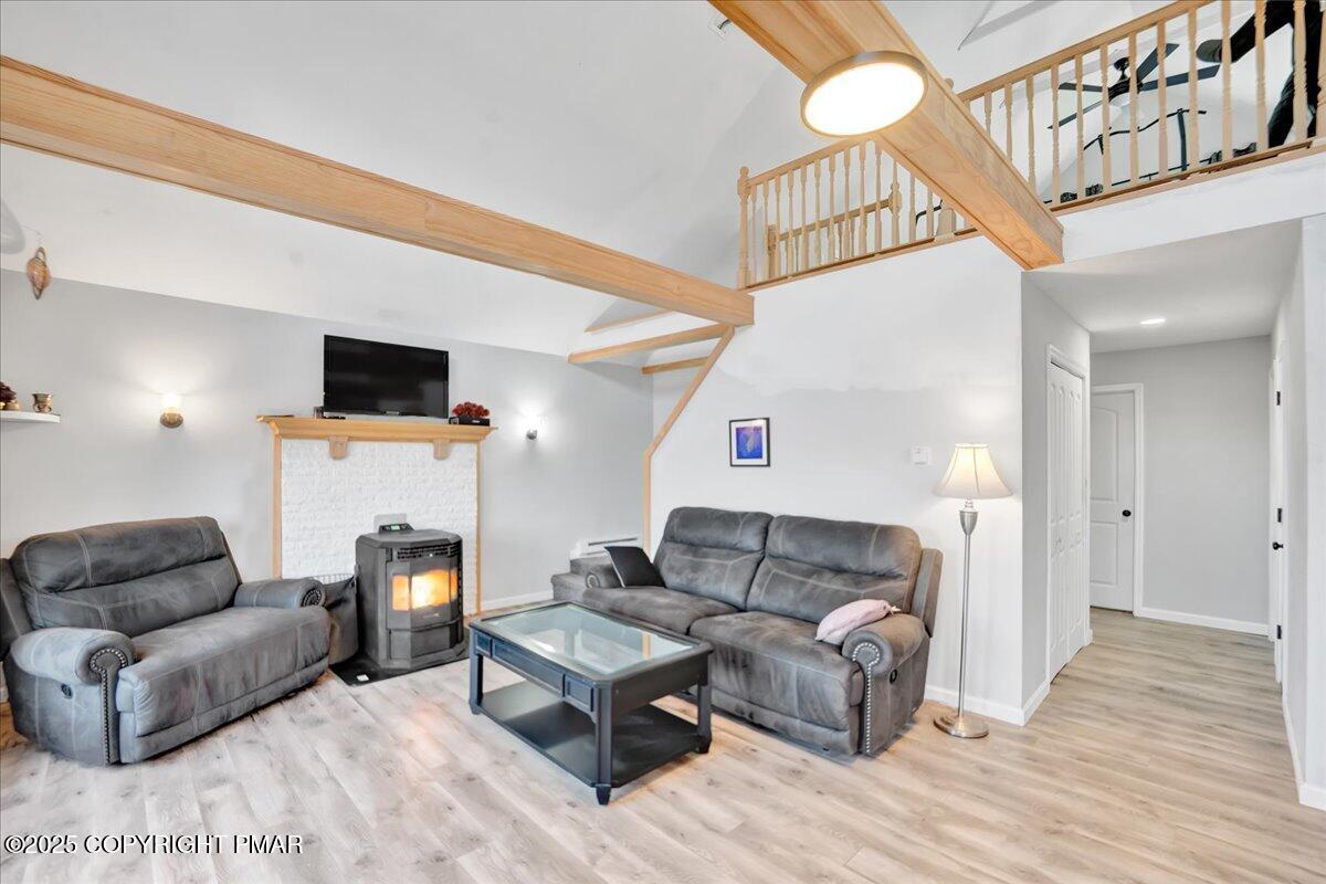 306 Timber Hill Road Henryville, PA 18332 - Photo 2 of 23 a living room with furniture and a fireplace