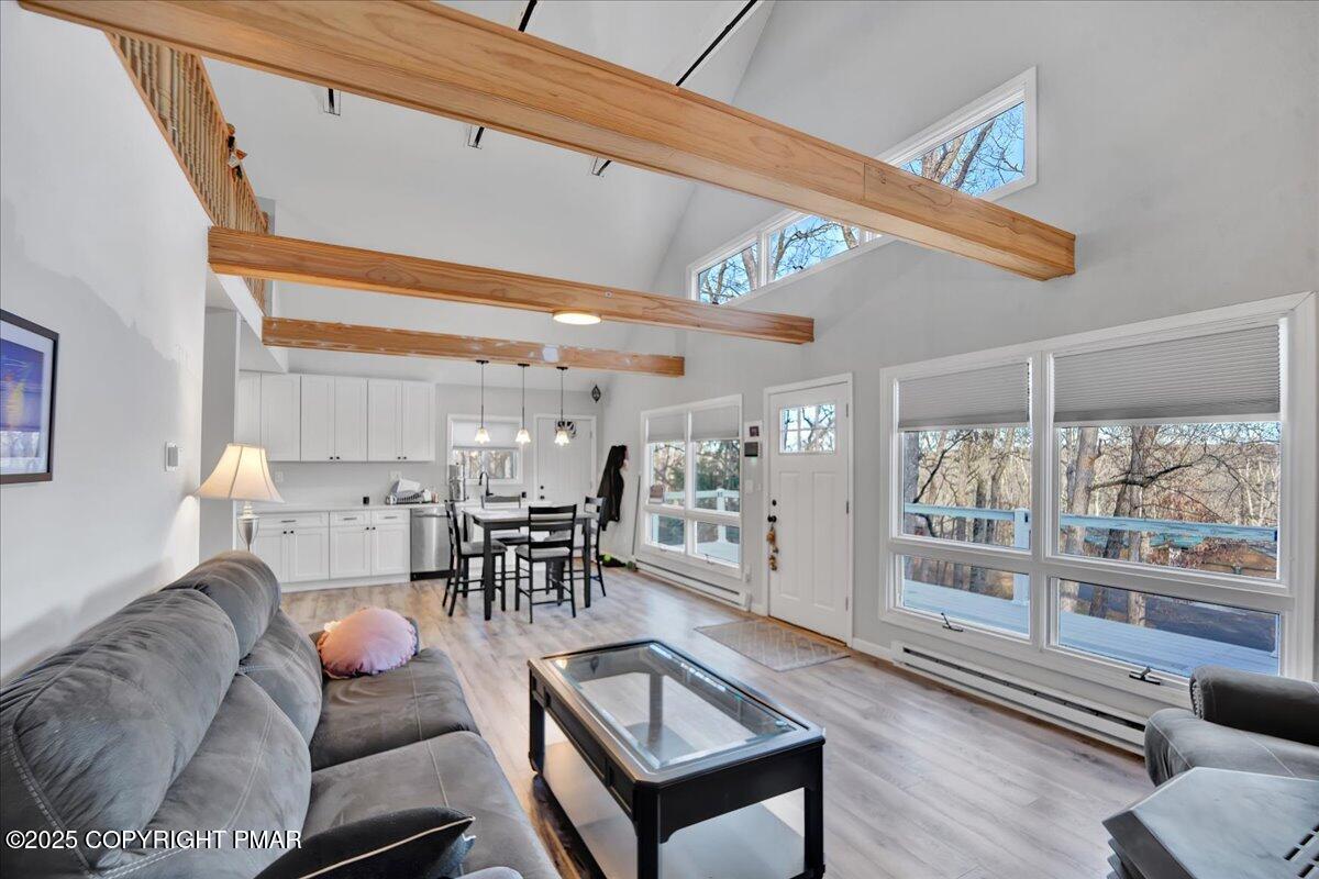 306 Timber Hill Road Henryville, PA 18332 - Photo 9 of 23 a living room with furniture and a large window