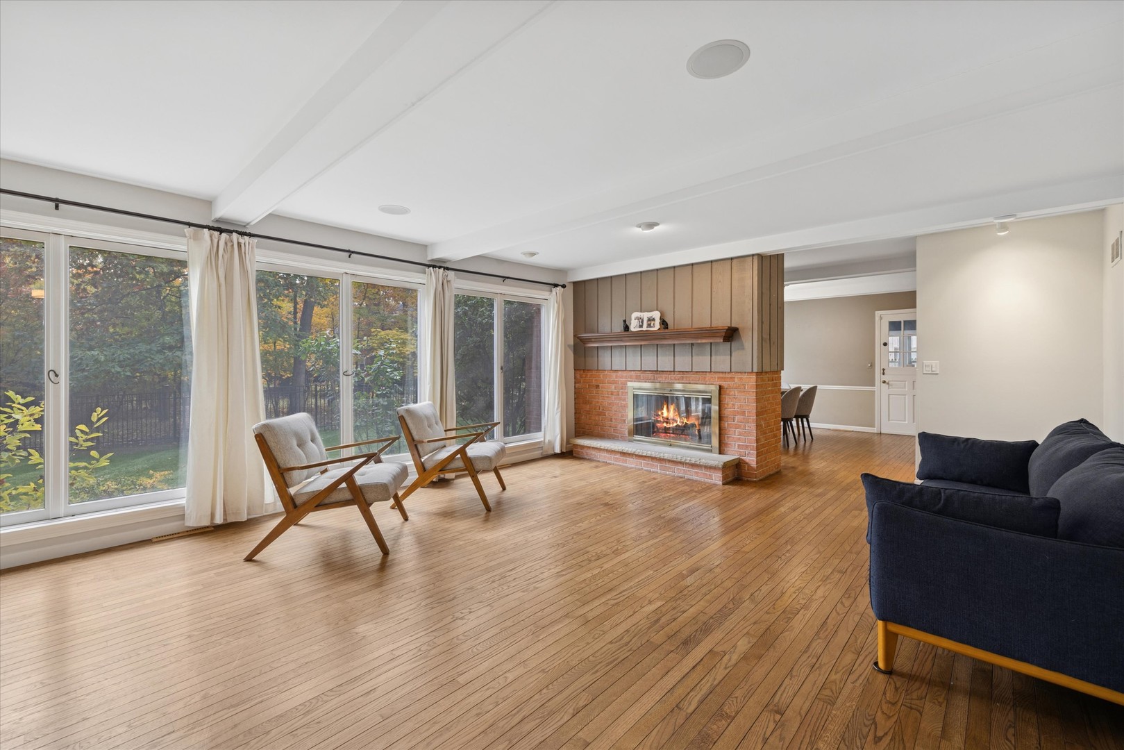 1233 Eastwood Lane Northbrook, IL 60062 - Photo 3 of 30 a living room with furniture and a wooden floor