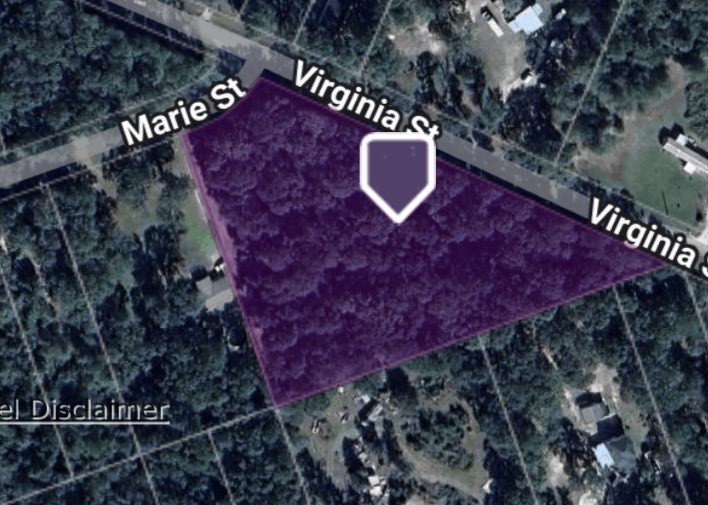 a outdoor view with a sign board