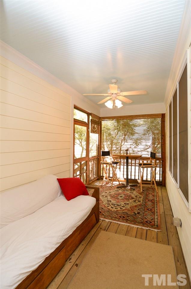 2216 Karns Place Raleigh, NC 27614 - Photo 22 of 25 a bedroom with furniture and large windows