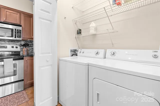 a utility room with dryer and washer