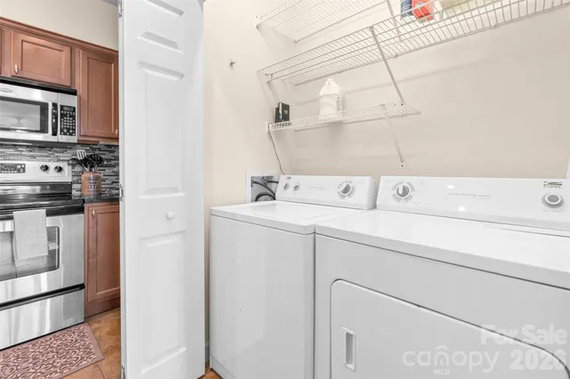 a utility room with dryer and washer