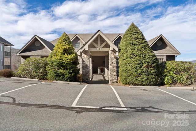 a front view of a house with yard