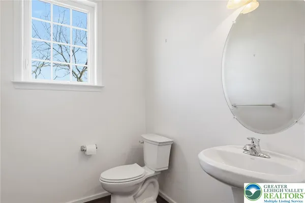 a view of a hallway with staircase