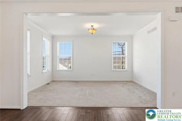 a bathroom with a sink toilet and a mirror