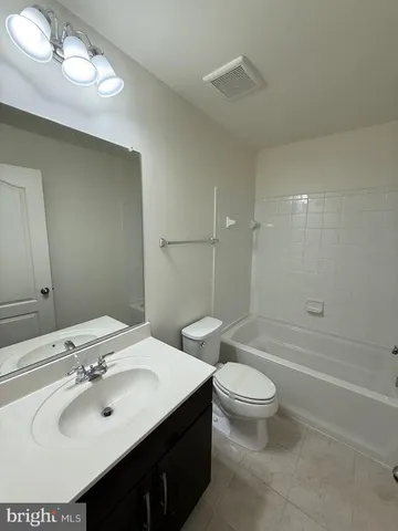 a view of utility room with sink
