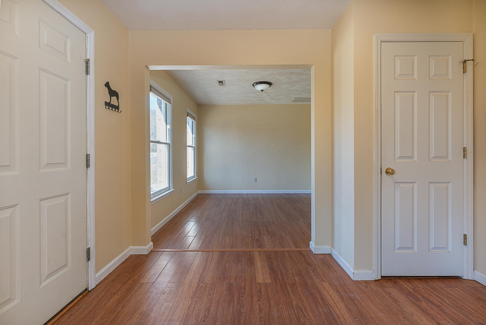 3490 Saunders Road Vinton, VA 24179 - Photo 26 of 60 a view of hallway with window and wooden floor