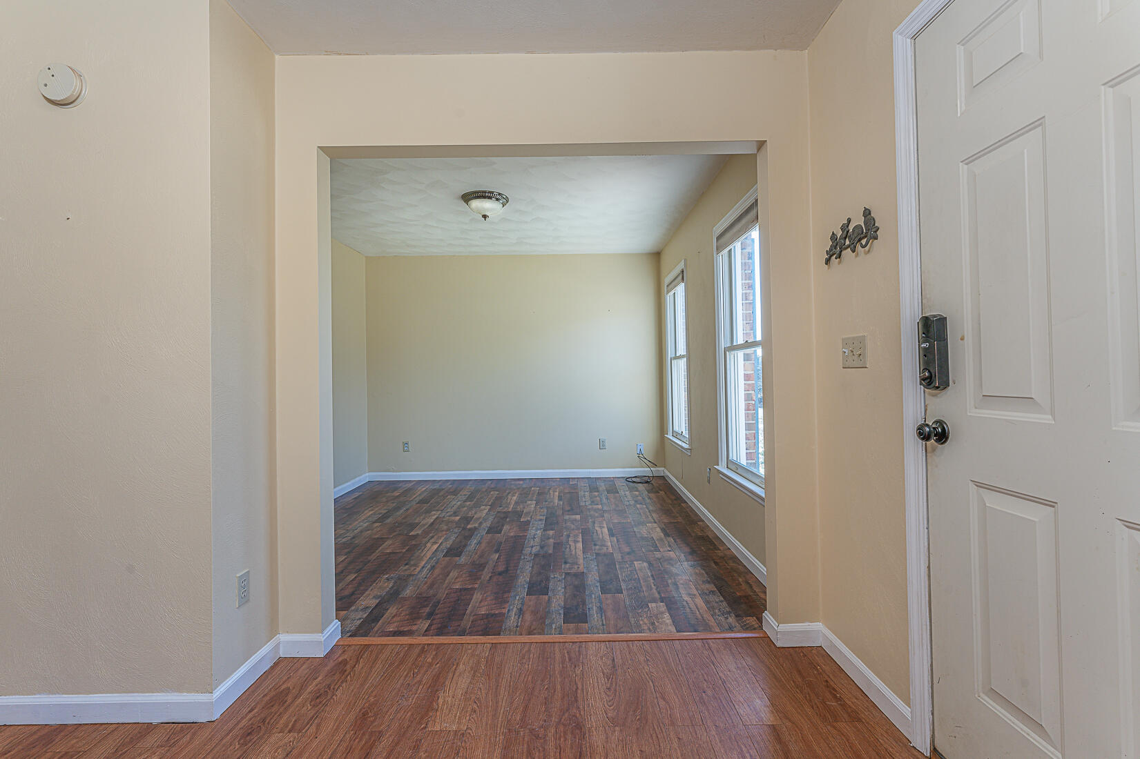 3490 Saunders Road Vinton, VA 24179 - Photo 27 of 60 a view of a hallway with wooden floor and staircase