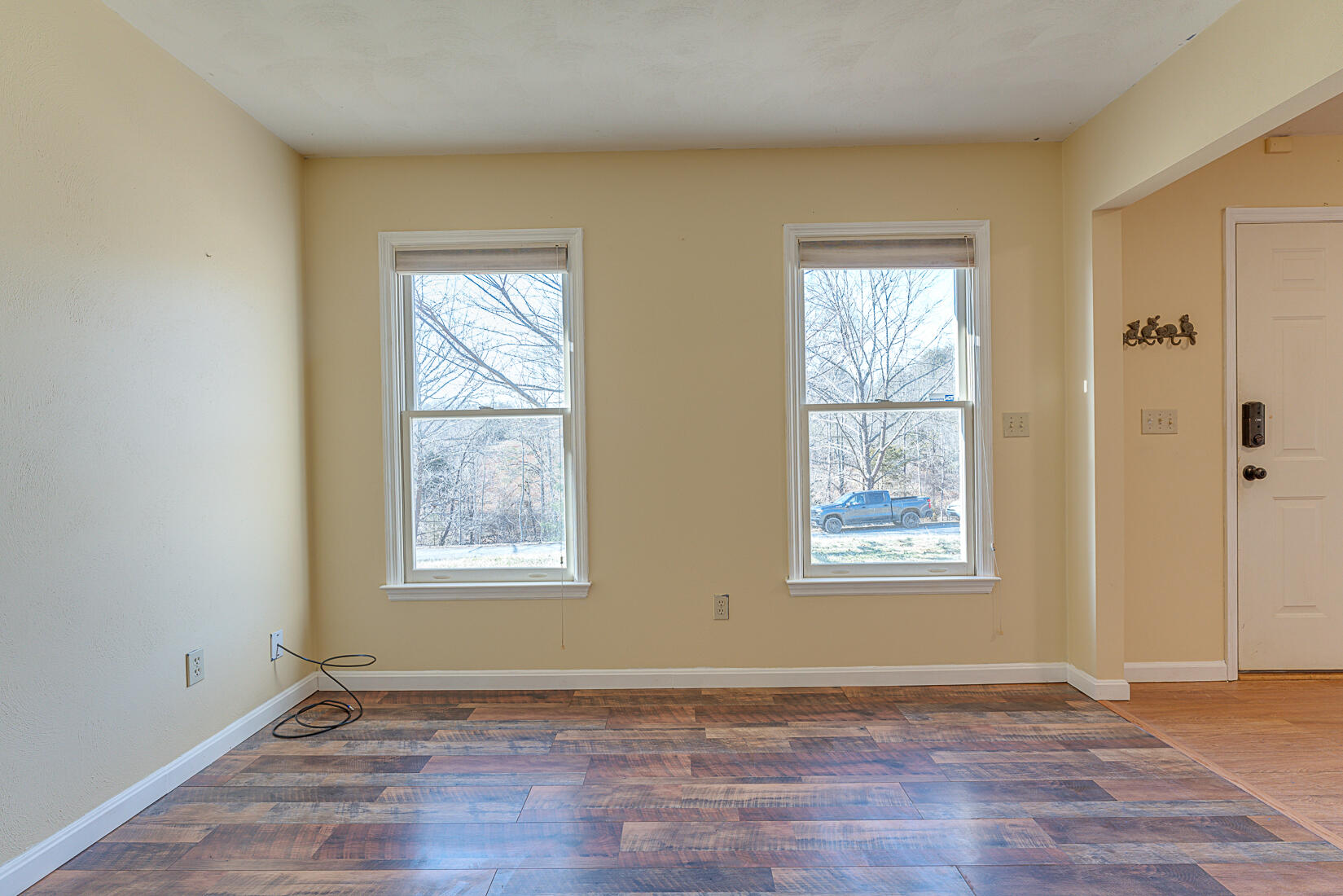 3490 Saunders Road Vinton, VA 24179 - Photo 28 of 60 a view of an empty room with wooden floor and a window