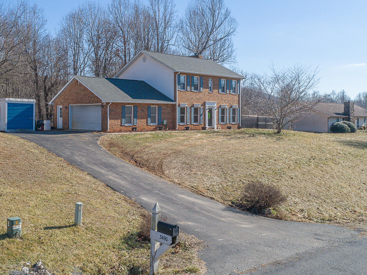 3490 Saunders Road Vinton, VA 24179 - Photo 6 of 60 a front view of a house with a yard