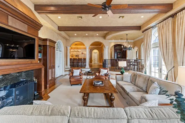 a view of a livingroom with furniture and chandelier