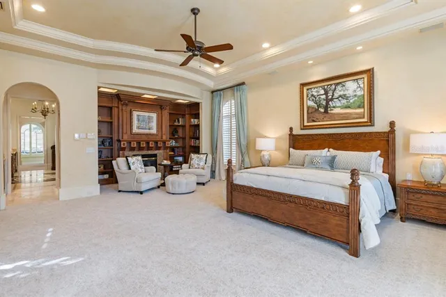 a bathroom with a granite countertop sink mirror and double