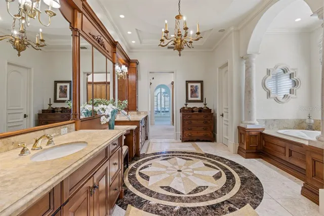 a living room with furniture a ceiling fan and a window