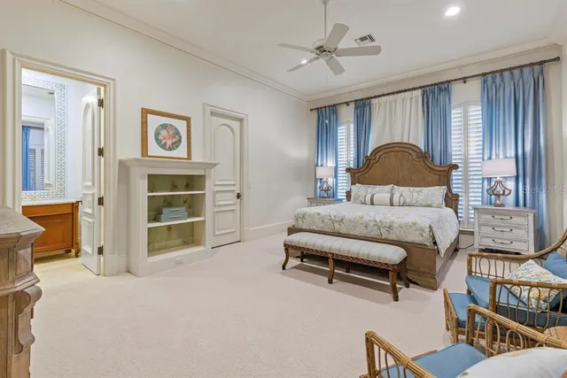 a swimming pool with outdoor seating and balcony